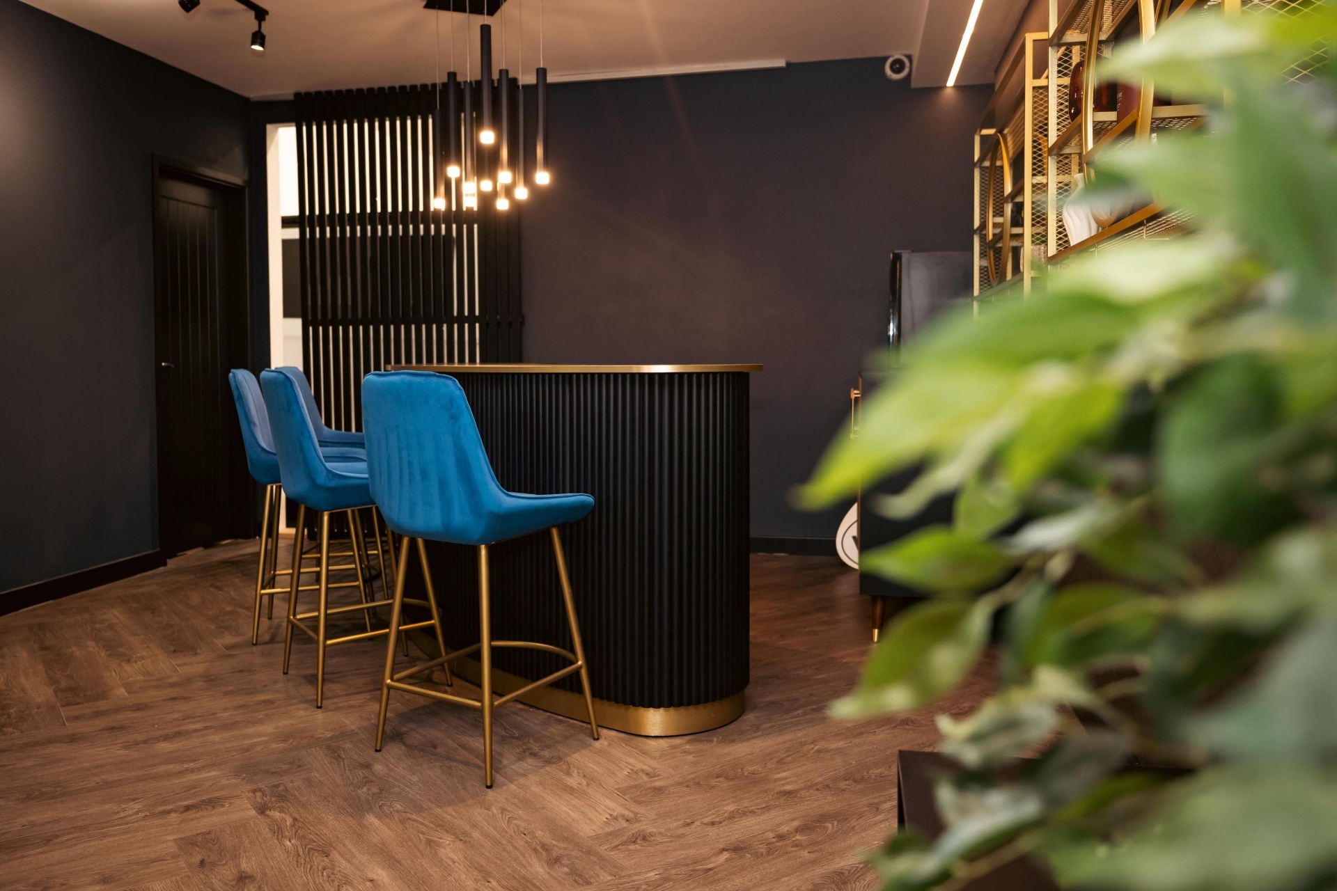 Fluted hospitality bar with velvet stools, contract furniture fit-out by Red Kite Furniture